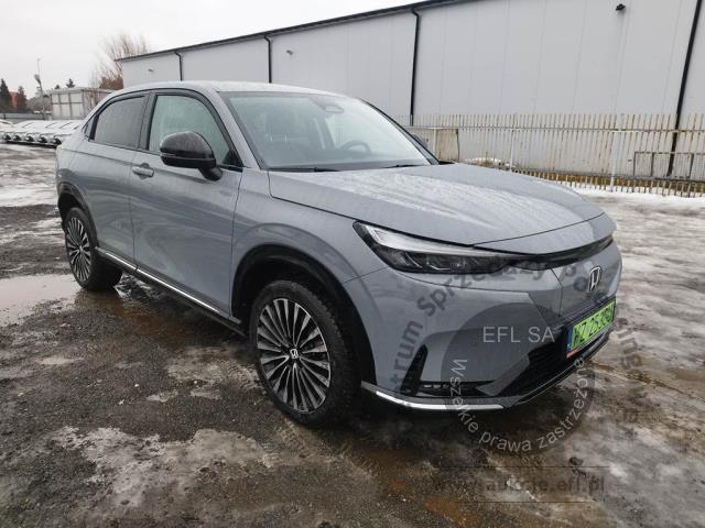 2 - Honda e:Ny1 Elegance Hatchback 2023r. WZ253GU Pojazd znajduje się w firmie ARCTOS GROUP sp. z o.o. Al. Krakowska 7, 02-183 Warszawa