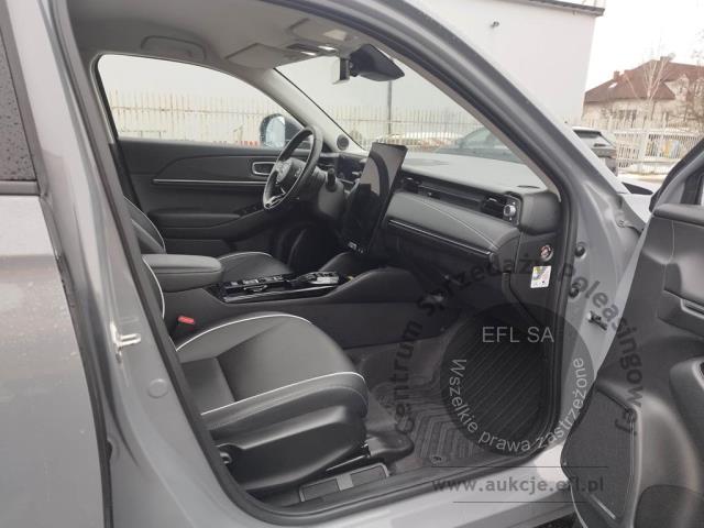12 - Honda e:Ny1 Elegance Hatchback 2023r. WZ253GU Pojazd znajduje się w firmie ARCTOS GROUP sp. z o.o. Al. Krakowska 7, 02-183 Warszawa