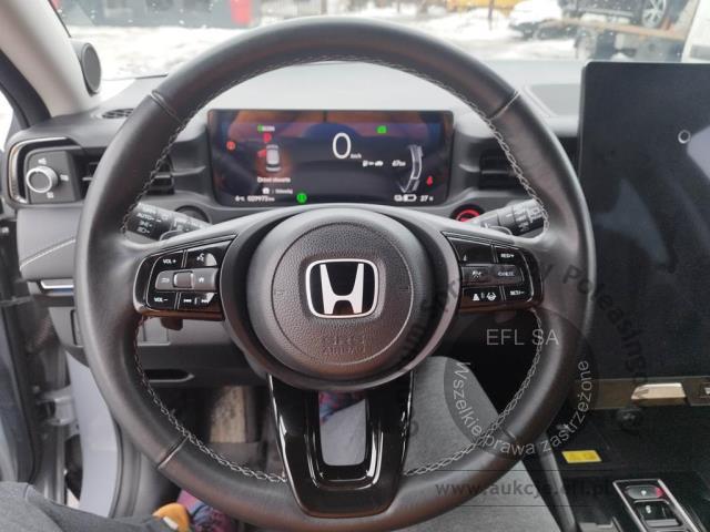 6 - Honda e:Ny1 Elegance Hatchback 2023r. WZ253GU Pojazd znajduje się w firmie ARCTOS GROUP sp. z o.o. Al. Krakowska 7, 02-183 Warszawa