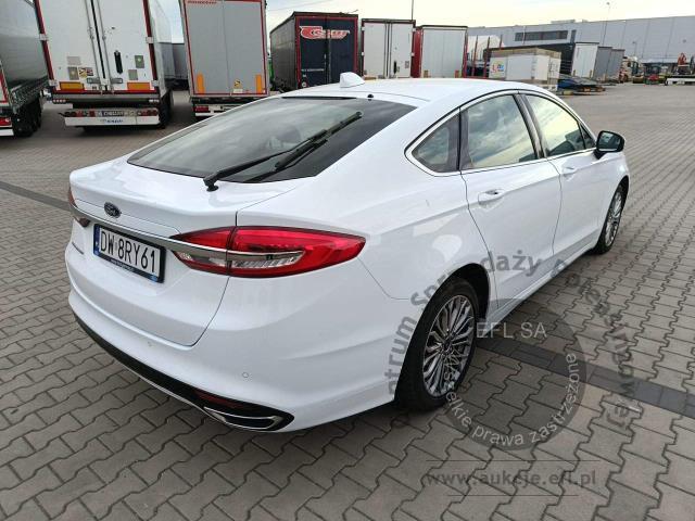 6 - Ford Mondeo 2.0 EcoBlue Titanium  2022r. DW8RY61 Pojazd znajduje się w firmie ARCTOS GROUP sp. z o.o. Al. Krakowska 7, 02-183 Warszawa