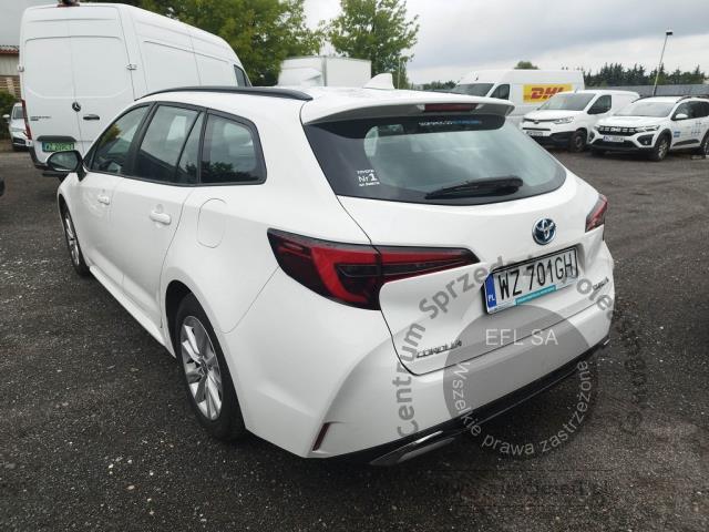 6 - Toyota Corolla 1.8 Hybrid Comfort 2023r. WZ701GH Pojazd znajduje się w firmie ARCTOS GROUP sp. z o.o. Al. Krakowska 7, 02-183 Warszawa