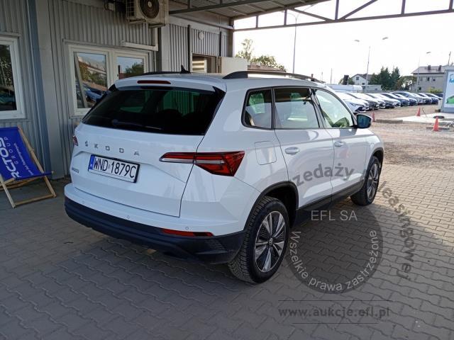 4 - Skoda Karoq 2.0 TDI SCR 4x2 Ambition 2022r. WND1879C Pojazd znajduje się w firmie ARCTOS GROUP sp. z o.o. Al. Krakowska 7, 02-183 Warszawa