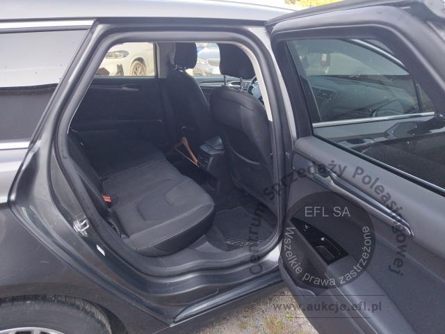 11 - Ford Mondeo 2.0 Hybrid Titanium 2022r. PY04649 UWAGA!! Pojazd znajduje się w firmie Arctos Sp. z o.o. Warszawa, Al. Krakowska 7, 02-183 Warszawa