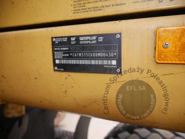 17 - Koparka kołowa Caterpillar M315C 2003r.