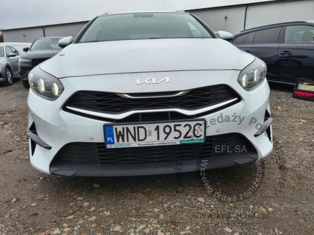 6 - Kia  Ceed 1.0 T-GDI M 2022r. WND1952C Pojazd znajduje się w firmie ARCTOS GROUP sp. z o.o. Al. Krakowska 7, 02-183 Warszawa