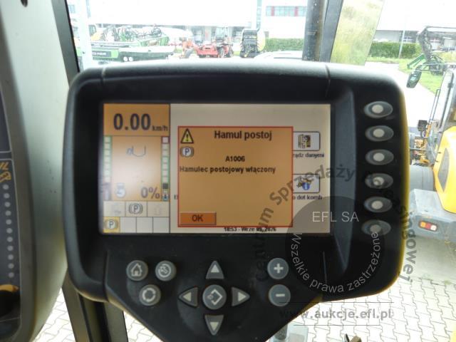 20 - EFL Finance Kombajn zbożowy New Holland CSX 7070 2009r. z hederem i wózkiem