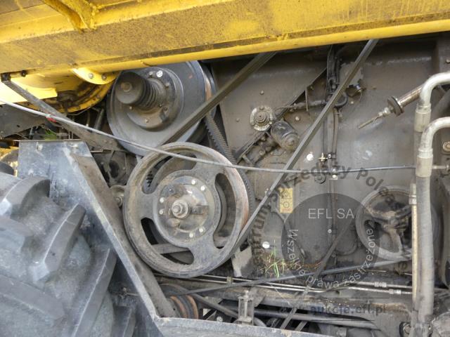 7 - EFL Finance Kombajn zbożowy New Holland CSX 7070 2009r. z hederem i wózkiem