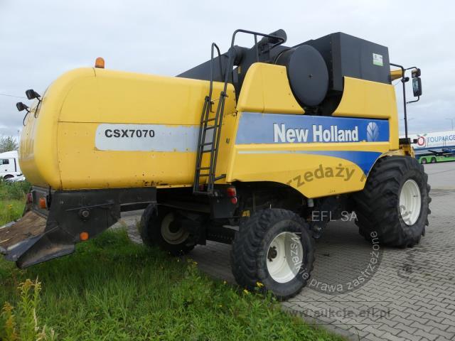 4 - EFL Finance Kombajn zbożowy New Holland CSX 7070 2009r. z hederem i wózkiem