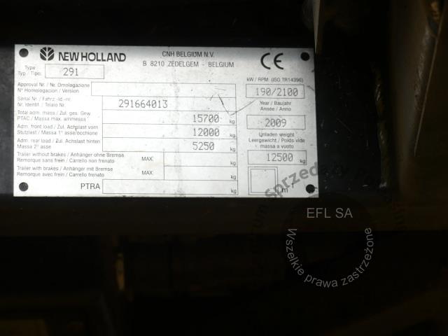33 - EFL Finance Kombajn zbożowy New Holland CSX 7070 2009r. z hederem i wózkiem