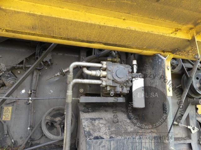6 - EFL Finance Kombajn zbożowy New Holland CSX 7070 2009r. z hederem i wózkiem