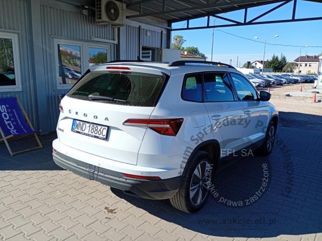 4 - Skoda Karoq 2.0 TDI SCR 4x2 Ambition 2022r. WND1886C Pojazd znajduje się w firmie ARCTOS GROUP sp. z o.o. Al. Krakowska 7, 02-183 Warszawa