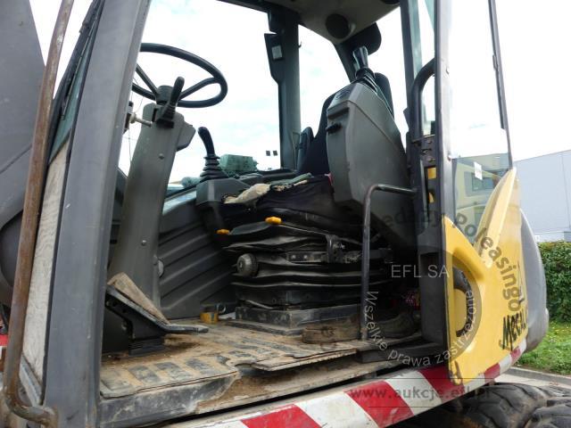 7 - EFL Finance Koparka kołowa Mecalac 714MW 2005r.