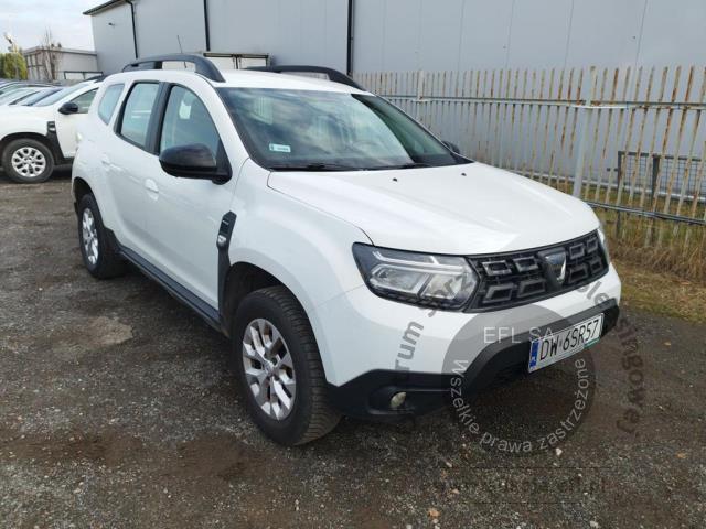 6 - Dacia  Duster  2022r. DW6SR57 Pojazd znajduje się w firmie ARCTOS GROUP sp. z o.o. Al. Krakowska 7, 02-183 Warszawa