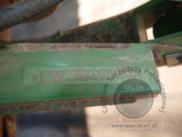 23 - EFL Finance Kombajn zbożowy John Deere  W550 2013r z hederem.