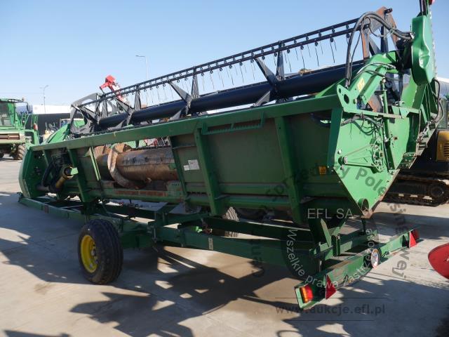 34 - EFL Finance Kombajn zbożowy John Deere  W550 2013r z hederem.