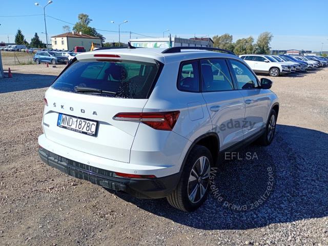 4 - Skoda Karoq 2.0 TDI SCR 4x2 Ambition 2022r. WND1878C Pojazd znajduje się w firmie ARCTOS GROUP sp. z o.o. Al. Krakowska 7, 02-183 Warszawa