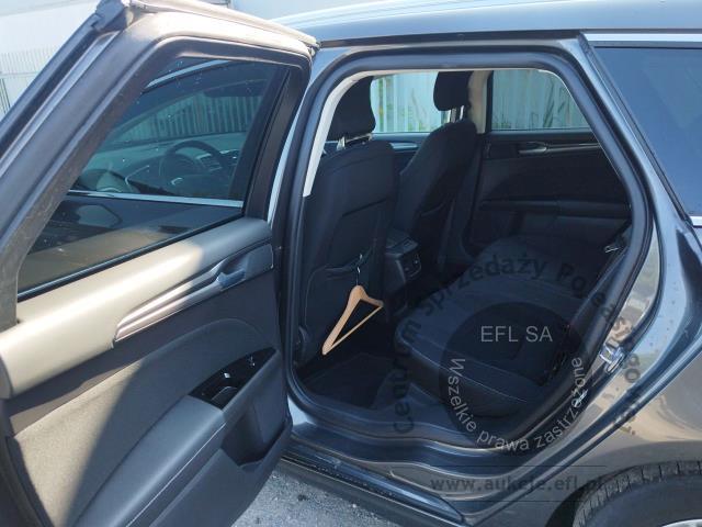 7 - Ford Mondeo 2.0 Hybrid Titanium 2022r. PY04649 UWAGA!! Pojazd znajduje się w firmie Arctos Sp. z o.o. Warszawa, Al. Krakowska 7, 02-183 Warszawa