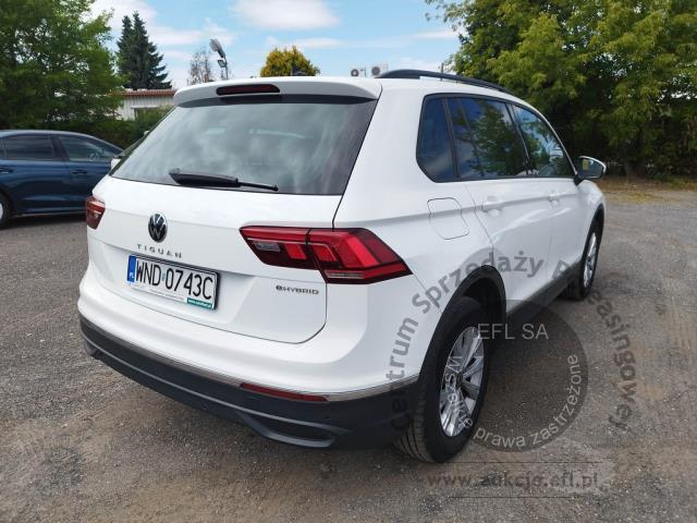4 - Volkswagen Tiguan 1.4 eHybrid Life DSG 2022r. WND0743C Pojazd znajduje się w firmie ARCTOS GROUP sp. z o.o. Al. Krakowska 7, 02-183 Warszawa