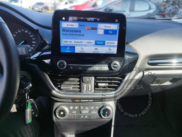 7 - Ford Fiesta 1.1 Titanium 2022r. DW6TW14 UWAGA!! Pojazd znajduje się w firmie Arctos Sp. z o.o. Warszawa, Al. Krakowska 7, 02-183 Warszawa