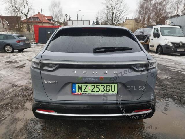 4 - Honda e:Ny1 Elegance Hatchback 2023r. WZ253GU Pojazd znajduje się w firmie ARCTOS GROUP sp. z o.o. Al. Krakowska 7, 02-183 Warszawa