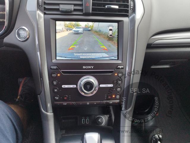 13 - Ford Mondeo 2.0 Hybrid Titanium 2022r. PY04649 UWAGA!! Pojazd znajduje się w firmie Arctos Sp. z o.o. Warszawa, Al. Krakowska 7, 02-183 Warszawa