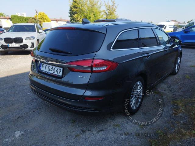 5 - Ford Mondeo 2.0 Hybrid Titanium 2022r. PY04649 UWAGA!! Pojazd znajduje się w firmie Arctos Sp. z o.o. Warszawa, Al. Krakowska 7, 02-183 Warszawa