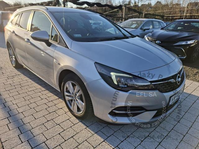 3 - OPEL  ASTRA  2021r. WW944SM Pojazd znajduje się w firmie AACAR sp. z o.o. Kasztanowa 5, 32-400 Jawornik