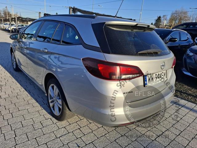 6 - OPEL  ASTRA  2021r. WW944SM Pojazd znajduje się w firmie AACAR sp. z o.o. Kasztanowa 5, 32-400 Jawornik