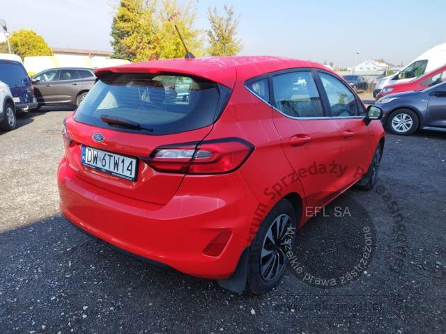 4 - Ford Fiesta 1.1 Titanium 2022r. DW6TW14 UWAGA!! Pojazd znajduje się w firmie Arctos Sp. z o.o. Warszawa, Al. Krakowska 7, 02-183 Warszawa