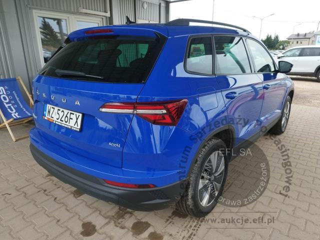 4 - Skoda Karoq 2.0 TDI SCR 4x4 Ambition DSG 2023r. WZ526FX Pojazd znajduje się w firmie ARCTOS GROUP sp. z o.o. Al. Krakowska 7, 02-183 Warszawa