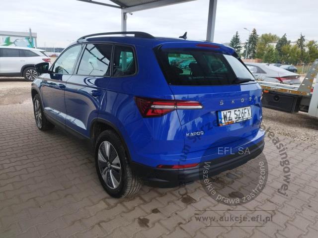 6 - Skoda Karoq 2.0 TDI SCR 4x4 Ambition DSG 2023r. WZ526FX Pojazd znajduje się w firmie ARCTOS GROUP sp. z o.o. Al. Krakowska 7, 02-183 Warszawa